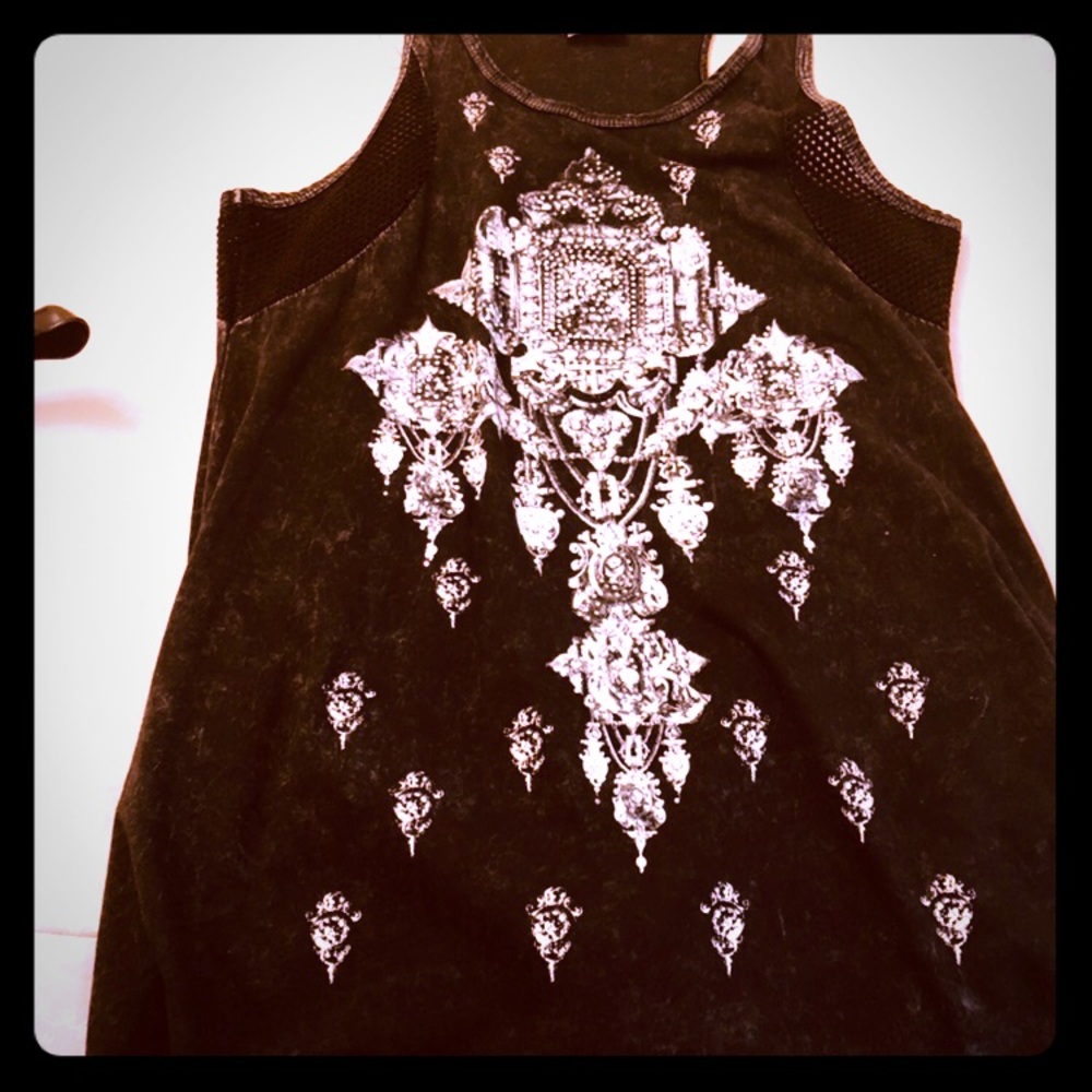 Embellished tank